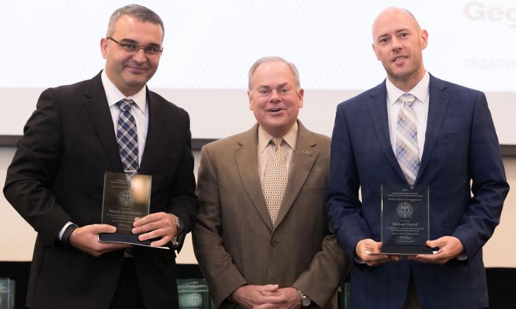 ECE Assistant Professor Manos Antonakakis and Chief Strategist GTRI CIPHER Laboratory Michael Farrell with Executive Vice President for Research Steve Cross