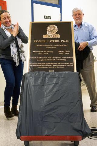 Daniela Staiculescu and Harry Beck alongside plaque Daniela Staiculescu and Harry Beck alongside plaque