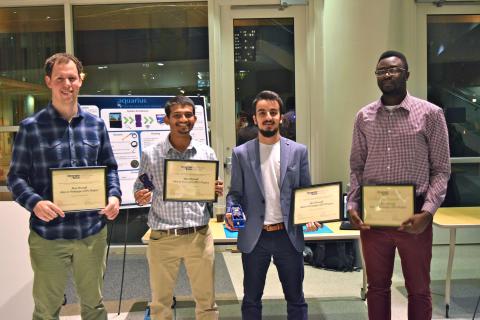 Team Aquarius members at the fall semester showcase for CREATE-X’s I2P program. Olatide Omojaro (right) is pictured with his teammates (L-R) Sam Youngdale, Daniel Albuquerque, and Elie Ghossain. Team Aquarius members at the fall semester showcase for CREATE-X’s I2P program. Olatide Omojaro (right) is pictured with his teammates (L-R) Sam Youngdale, Daniel Albuquerque, and Elie Ghossain.